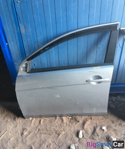 Митсубиси Лансер Дверь передняя левая серебро
