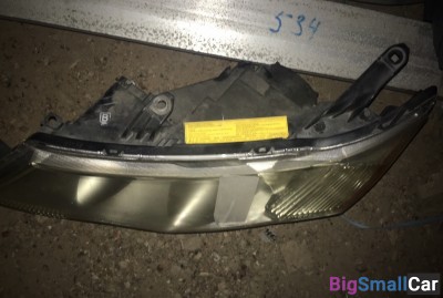 Фара левая ксенон аутлендер 2008