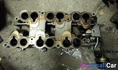 Нижняя часть коллектора впускного Ford Contour 2.5L б/у