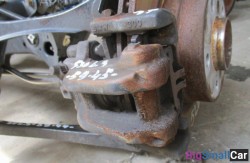 Суппорт задн. лев. (34 Тормозные механизмы) 34116799465